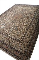 Full view of small Nain Persian rug showing the animal and floral design, colors, and visible wear/stains.