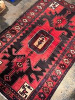 Angled top-down view showing full rug design and color palette