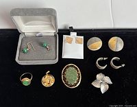 Overview of all jewelry pieces on black background