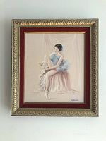 Framed vintage oil painting of a seated ballerina adjusting pointe shoe, signed M. Roper.