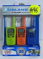 Front view of the boxed three-pack of Midland X-Talker walkie talkies, showing green, orange, and blue radios.