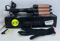 EMOCCI PRO 3-barrel curling iron on original box with heat-resistant glove, hair brush, and hair clip.