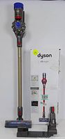 Assembled Dyson V8 Origin with extension wand, soft roller head, docking station and original box