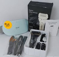Electric callus remover with box, instruction manual, 4 roller heads, cleaning brush, SlimPai blue massager and 3 foot files visible