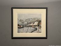 Full view of framed lithograph showing the artwork centered within a cream mat and a dark brown decorative frame.