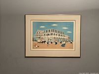 Framed artwork 'The Cycling Craze' hanging on a gray wall, showing the complete piece in the frame.