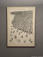 Straight-on view of framed poster against wall