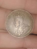 Obverse side of the 1914 Canadian one cent coin showing King George V portrait and legend.