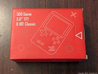 Red box packaging for Sakuria Handheld Game 500 with 3.0 inch TFT screen, 8-bit classic games