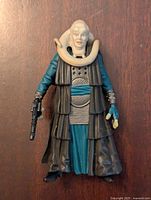 Front view of the Bib Fortuna Kenner Star Wars action figure showing detailed costume and blaster accessory in hand.