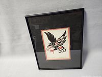 Frontal view of framed silk screen print featuring a stylized eagle design by Doug La Fortune titled "Eagle Free Spirit"