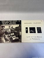Both vinyl LPs, The Gifted Ones and Michael Kleniec Live at the Soho in Toronto, shown side by side for identification.
