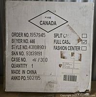 Box packaging showing model and style number, quantity, and manufacturing details.