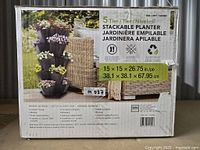 Photo of the box showing the product name, features, dimensions, and material info.