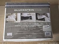 Front packaging showing brand, product name and contents of 3 piece king duvet cover set