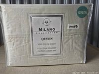 Sealed packaging showing Milano Collection label and Queen size sticker