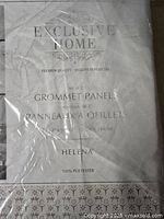 Packaging label showing brand, product line - 'Exclusive Home', Helena 2-piece grommet panel set, size 54x96 inches, 100% polyester.