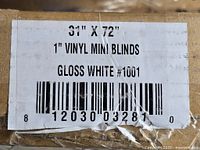 Label showing dimensions 31 x 72 inches, 1 inch vinyl mini blinds, gloss white finish #1001.