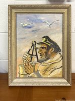Frontal image of the oil painting featuring a captain looking through a sextant with birds overhead, in an ornate frame.