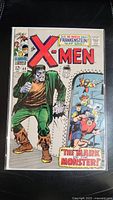 Front cover overview of X-Men #40 showing Frankenstein and X-Men characters