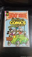 Front cover of the Walt Disney Comics and Stories #500 anniversary issue showing Disney characters in a green car.