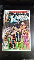 Full cover of The Uncanny X-Men comic book issue #167 showing main characters in colorful illustrated style.