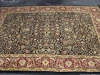 Top-down view of entire rug laid flat on driveway