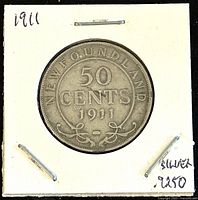 Front side of 1911 Newfoundland 50 Cents silver coin showing denomination and year.