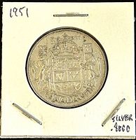 Front side of the 1951 Canadian 50 cents coin showing the Canadian Coat of Arms and the silver content note on the holder.