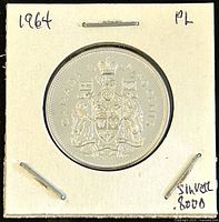 Obverse side of 1964 Canadian 50 cent silver proof-like coin showing crowned coat of arms.