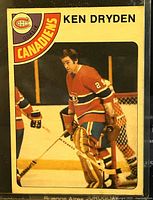 Front side of Ken Dryden hockey trading card showing him in goalie gear with Canadiens logo and team name