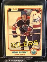 Front of 1981-2 O-Pee-Chee Wayne Gretzky Oilers hockey trading card showing Gretzky in Oilers uniform, card in protective sleeve.