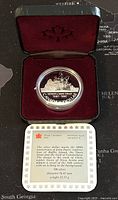 1987 Canadian silver proof dollar coin in presentation case with certificate