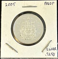 Reverse side of the 2005 Canadian 50 cents solid silver proof coin showing the Canadian coat of arms, year, and denomination.
