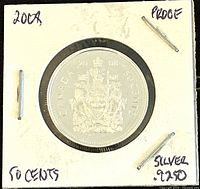 Front side of 2008 Canadian 50 cents silver proof coin showing Canadian Coat of Arms and inscriptions.