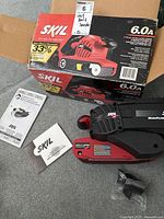 Skil 7500 3-belt sander in red and black with original box, manuals and small accessories bag