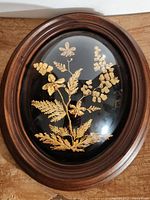 Frontal image of the framed 24K gold plated floral wall art showing the entire piece and detailing.