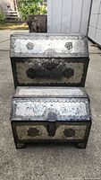 Two vintage Mexican pierced tin and wood chests stacked, showing front and size comparison.