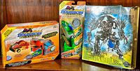 Photo of LEGO Bionicle Von Nebula set box alongside two Beyblade Beywarriors Beybladerz sets showing overall lot contents.
