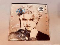 Front cover of Madonna debut album vinyl LP with original shrink-wrap and hype sticker