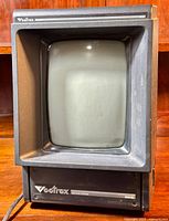 Front view of Vectrex console showing CRT monitor bezel and logo