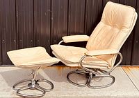 Chair and ottoman side view showing overall styling