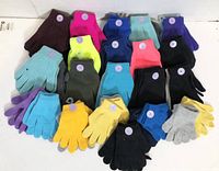 Twenty pairs of colorful winter gloves neatly arranged in rows; various colors and sizes for kids and adults.