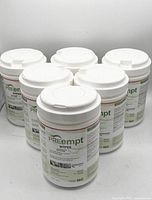 Six white cylindrical plastic containers of PREempt antimicrobial surface sanitizing wipes with labels visible showing product details and sheet count of 160 each.