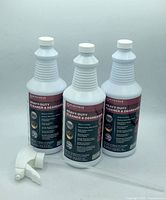 Three bottles of Bioesque Heavy Duty Cleaner & Degreaser with white spray nozzles displayed side by side on a flat surface against a plain background.