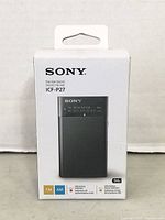 Sony ICFP27 Portable AM/FM Radio in original packaging, showing front image and brand details.