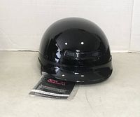 Front view of the glossy black half helmet with GLX tags and plain smooth finish.
