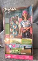 Full front view of the sealed Barbie 'Nsync #1 Fan Teresa doll packaging, showing Teresa in fan attire with 'Nsync branding and visible CD in the box.