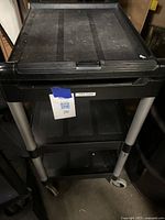 Close-up showing label and two shelves from angle