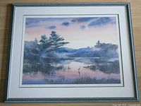 Full view of framed artwork showing the print and frame